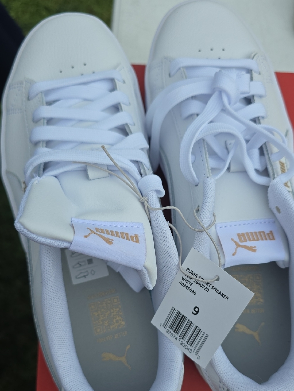 Puma White Sneakers with Gold Logo